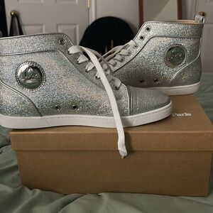 Silver women’s Christian Louboutin high top sneakers size 11